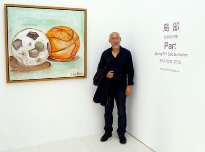Zhang Enli at the opening of ShanghART Singapore's debut exhibition, Part, in 2012.