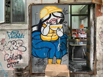 Cath Love, Construction Work Jeliboo (2017). Aerosol mural on gate, Ladder Street, Hong Kong.