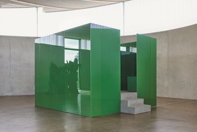 Cristina Iglesias, Pabellón de Cristal (2014). Green glass, metal structure, resin, iron powder, hydraulic system and water. 310 x 400 x 468 cm.