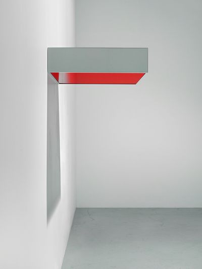 Donald Judd, Untitled (1979). Stainless steel and red plexiglass. 15.2 x 68.6 x 61 cm.