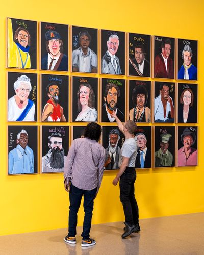 Vincent Namatjira (Western Aranda people) and Manager, Heath Aarons, Iwantja Arts, with Vincent Namatjira: Australia in colour, installation view, National Gallery of Australia, Kamberri/Canberra, 2024.