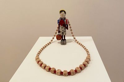 Hayden Haynes, Pretendians (2024). Moose antler, wood, whitetail deer antler, leather dye, stove polish, enamel paint and beads made of marine shell, wood, quartz, red acrylic, and black glass. 14 x 18 x 23 cm.