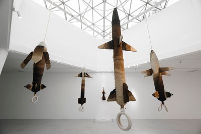 Lo Yi-Chun, Bagasse Missiles (2024). Bagasse, tobacco, sulphur powder, bamboo. Various sizes.
