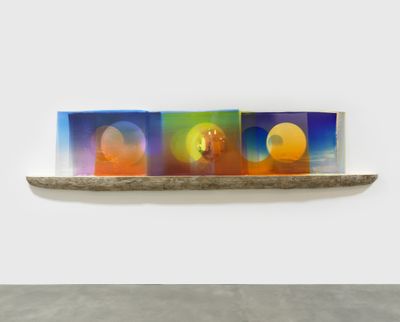 Olafur Eliasson, Your sun seen from Mars (2020). Coloured glass, colour-effect filter glass, silver, driftwood. 81 x 352 x 15.5 cm.