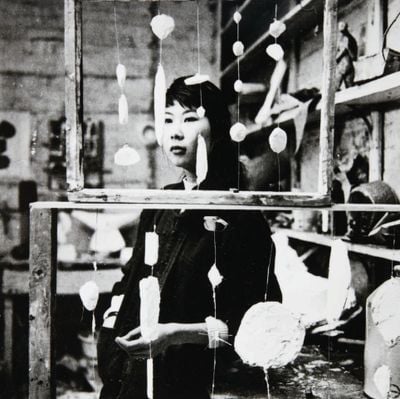 Kim Lim in her studio, with Abacus I and II (1959).