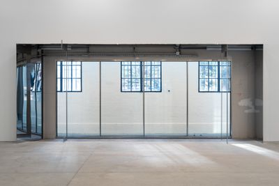 Thea Djordjadze, .pullherawaypull. (2020). Steel, fire-tempered glass. 6000 × 2400 × 121 cm. Exhibition view: My Body Holds Its Shape, Tai Kwun Contemporary, Hong Kong (25 May–20 September 2020). Commissioned by Tai Kwun Contemporary.