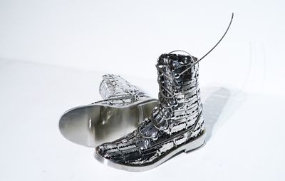 Tayeba Begum Lipi, The Colombian Boots (2018). Stainless steel. 27.94 x 15.2 x 8.9 cm. Courtesy the artist.