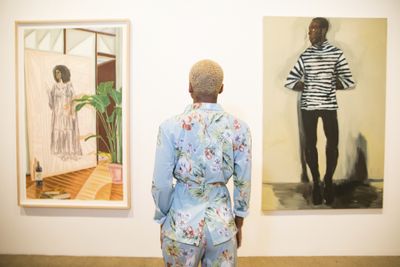 Toyin Ojih Odutola, Unfinished Commission of the Late Baroness (2017). Charcoal, pastel, and pencil on paper. 77 x 48 x 2.5 inches; Lynette Yiadom-Boakye, SAM Friday (2018). Oil on linen. 78 7/8 x 51 ¼ x 1 1/12 inches. Collection of Beth Rudin DeWoody. Courtesy Stony Island Arts Bank. Photo: Justin Barbin.
