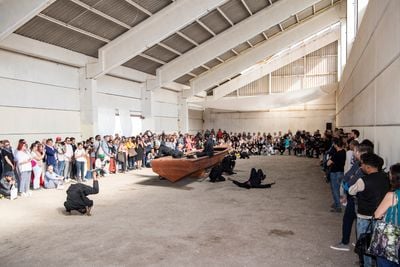 Mohau Modisakeng, Land of Zanj (2019). Performance by Thembekile Komani and Aphiwe Mpahleni Mohau Modisakeng. Performance view: Sharjah Biennial 14: Leaving the Echo Chamber, Kalba Ice Factory (7 March–10 June 2019). Courtesy Sharjah Art Foundation.