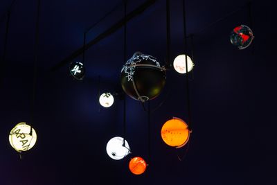Ingo Günther, Worldprocessor (1988–ongoing). Illuminated globes. 30 cm diameter sphere each. Exhibition view: Post-Nature—A Museum as an Ecosystem, the 11th Taipei Biennial, Taipei Fine Arts Museum (17 November 2018–10 March 2019). Courtesy © the artist and Taipei Fine Arts Museum.