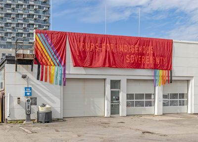 ReMatriate Collective, YOURS FOR INDIGENOUS SOVEREIGNTY (2018). Applique banner. Exhibition view: The Shoreline Dilemma, Toronto Biennial of Art, 259 Lake Shore Boulevard East, Toronto (21 September–1 December 2019). Courtesy Toronto Biennial of Art. Photo: Toni Hafkenscheid.