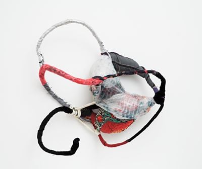 Sonia Gomes, Untitled, from the series ‘Patuá’ (2005). Stitching, bindings, different fabrics and laces on wire. 50 x 50 x 27 cm. © Sonia Gomes. Courtesy the artist or Estate, Blum & Poe, Los Angeles/New York/Tokyo; Mendes Wood DM; and Almeida e Dale Galeria de Arte.