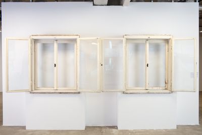 Szabolcs KissPál, Silicon valse (2001). Two manipulated regular windows, wood, glass. Exhibition view: Landscape in a Convex Mirror, 4th Art Encounters Biennial, Timișoara (1 October–7 November 2021).