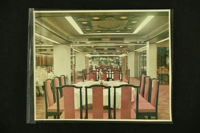 A restaurant in 1970s Hong Kong, with ceiling decoration by Ha Bik Chuen. This photo was found in a Kodak box titled Restaurant Decoration in Ha's archive.