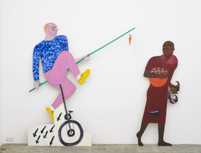 Cutout of a white man on a unicycle dangling a carrot stick in front of a black man. 