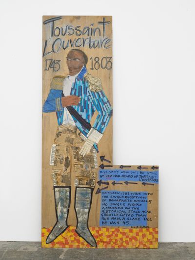 Full-length portrait of a Black man painted on a wooden board with the words Toussaint L'Ouverture. 