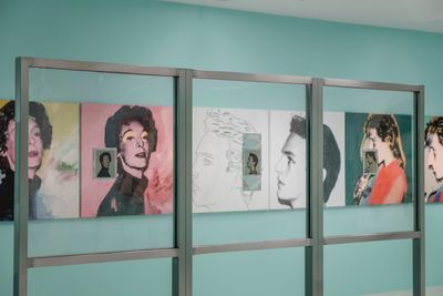 Series of pop art portraits showing man from profile and side surrounded by metal frame