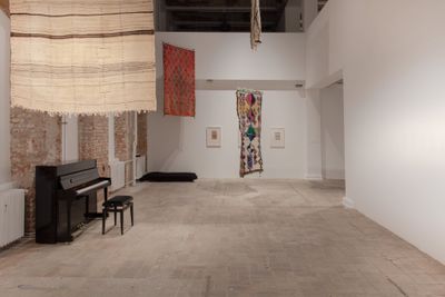 Myriam El Haïk, Please Patterns (2022). Installation and performance for drawings, rugs, and piano. Exhibition view: 12th Berlin Biennale, Still Present!, KW Institute for Contemporary Art, Berlin (11 June–18 September 2022).