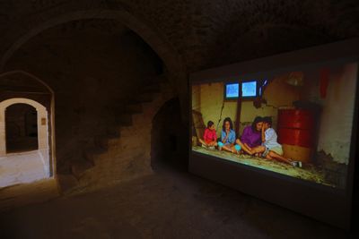 Mikhail Karikis, Children of Unquiet (2014). H.D. video with stereo sound. 15 min, 37 sec. Exhibition view: 5th Mardin Biennial, The Promise of Grass, German Headquarters, Mardin (20 May–20 June 2022).