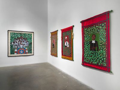 Left to right: Faith Ringgold, Coming to Jones Road Part 2 #2; We here Aunt Emmy Got Us Now (2010). Acrylic on canvas with fabric border. 172.7 x 160 cm. Exhibition view: American People, New Museum, New York (17 February–5 June 2022).