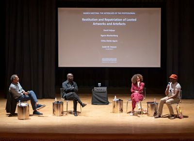 Chika Okeke-Agulu speaking during 'Restitution and Repatriation of Looted Artworks and Artefacts', a panel with Sir David Adjaye and Ngaire Blankenberg, moderated by Salah M. Hasan at March Meeting, Sharjah Art Foundation (4 March–4 July 2022). Photo: Shanavas Jamaluddin.