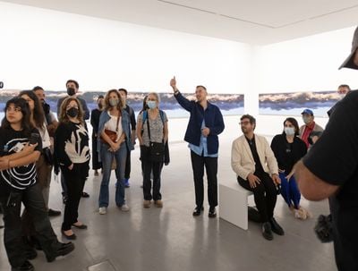 Lawrence Abu Hamdan giving a tour of his new work, Air Conditioning (2022), commissioned by Sharjah Art Foundation, at the opening of The Sonic Image, Sharjah Art Foundation (4 March–4 July 2022). Photo: Shanavas Jamaluddin.
