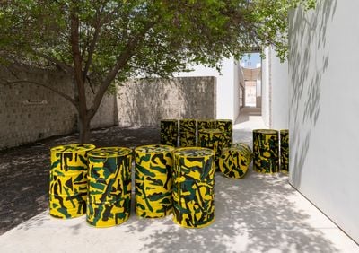 Chandraguptha Thenuwara, Barrelscape (1998–ongoing). Painted barrels. Dimensions variable; 88.9 x 58.42 cm (each).