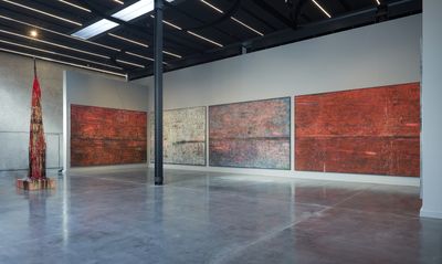 Left to right: Sterling Ruby, Monument stalagmite / Everyday Carry (2012). Mixed media. 541 x 101.6 x 160 cm. Original; 'SP217' (1 to 5) (2012). Spray paint on canvas. 406.4 x 597 x 5 cm (each). Original. Exhibition view: Beyond Boundaries, Concrete, Dubai (11–25 November 2022).