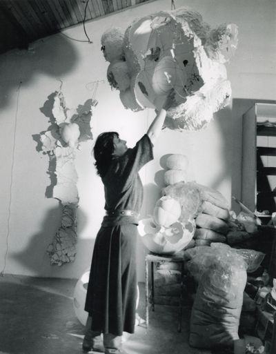 Unknown Artist, Maria Bartuszová in her studio with sculptures, Košice, Slovakia (1987). Printed 2022. Reproduced from the archive of Maria Bartuszová, Košice.