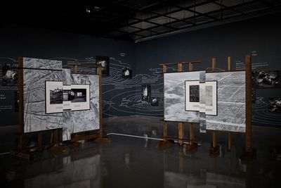 Yusuke Kamata, Japanese Houses, Stone Garden of Imperialism (2022). Wood, inkjet print, acryl, paint, sand, and monitors. 455 x 1160 x 1020 cm. Exhibition view: Busan Biennale, We, on the Rising Wave (3 September–6 November 2022).