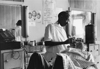 Barbershop, Tuskegee, Alabama by Chester Higgins contemporary artwork photography