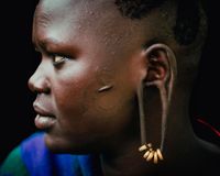Profile of Suri Woman Ear, Omo Valey, Ethiopia by Andrew Eldon contemporary artwork photography, print