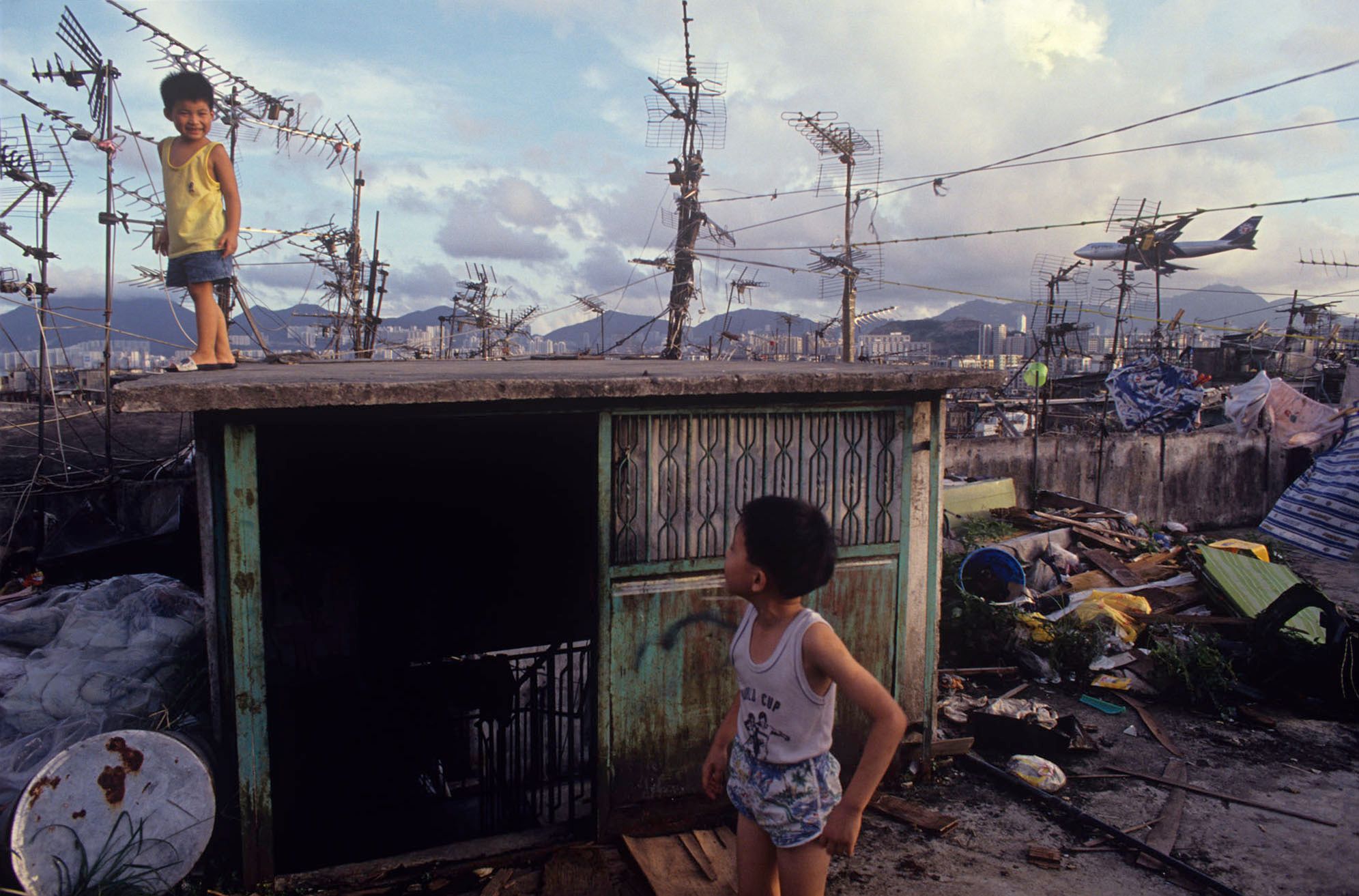 Children on Kowloon Walled City Rooftop, Hong Kong, 1989 by Greg Girard ...