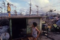 Children on Kowloon Walled City Rooftop, Hong Kong by Greg Girard contemporary artwork photography, print