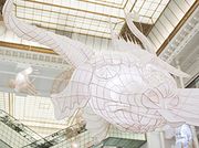 Ai WeiWei hangs bamboo + paper kite creatures in Paris' Le Bon Marché department store
