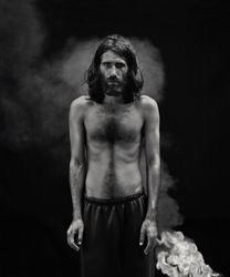 Hoda Afshar Behrouz Boochani – Manus Island, from the series 'Remain' (2018). Pigment photographic print. 130 x 104 cm. Art Gallery of New South Wales, purchased with funds provided by the Contemporary Collection Benefactors 2020. Courtesy Hoda Afshar. Photo: © Art Gallery of New South Wales.Image from:Hoda Afshar, Unflinching Photo Artist, to Show at AGNSWRead NewsFollow ArtistEnquire