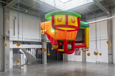 Tromarama, Patgulipat (2022). Inflatable castle, speaker, construction helmet, paracord, mini PC, custom software, #assignment. SoundFont: Harsya Wahono. Variable dimension. Exhibition view: PERSONALIA, ROH, Jakarta (20 August–2 October 2022). Courtesy the artists and ROH.Image from:Tromarama: Rethinking the Locales of the Global SystemRead ConversationFollow ArtistEnquire