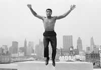 Ali jumping from a bridge over Chicago river by Thomas Hoepker contemporary artwork photography