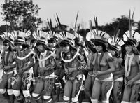 Yawalapiti women dance at the women’s festival, Yamurikumã, Kamayurá village, Xingu Indigenous Territory, state of Mato Grosso, Brazil by Sebastião Salgado contemporary artwork photography