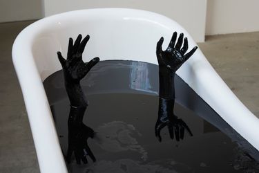 Monira Al Qadiri, Deep Float (2017). Bathtub sculpture. Epoxy, acrylic, steel. 150 x 75 x 87 cm. Courtesy the artist. Photo: Stroom den Haag.Image from:Monira Al Qadiri Dives Deep Into OilRead ConversationFollow ArtistEnquire