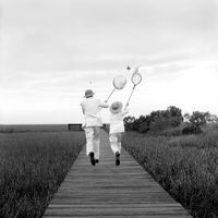Gary and Henry Chasing Butterfly, Beafort, SC by Rodney Smith contemporary artwork photography