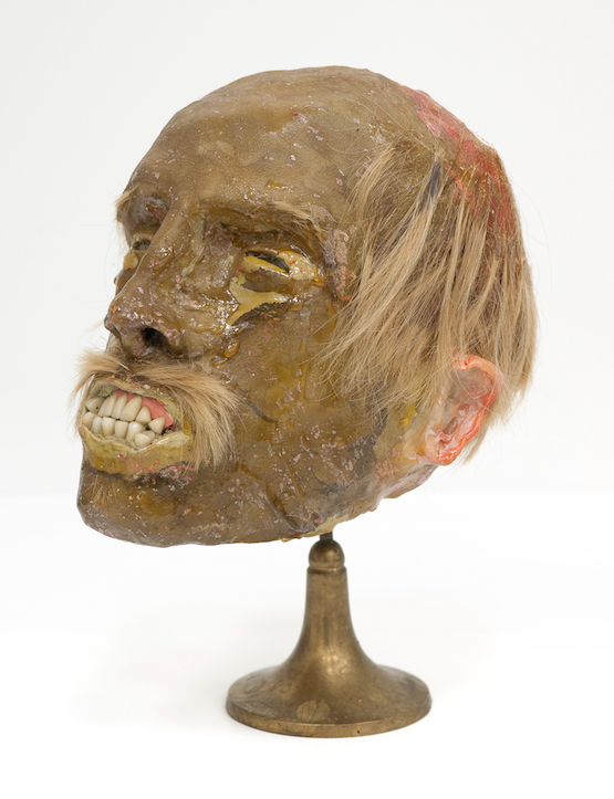 Francis Upritchard, Untitled 1 (2002–2003). Fiberglass, resin, fake hair and dental teeth. 27 x 20 x 18 cm.  Chartwell Collection, Auckland Art Gallery Toi o Tamaki (2003).