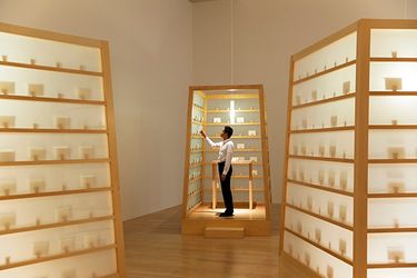 The Letter Writing Project, 1998/2014. Mixed media interactive installation — three wooden booths, writing papers, envelopes, 290 x 170 x 231 cm each. Exhibition view at 'Lee Mingwei and His Relations,' Mori Art Museum, Tokyo, 2014. Photo: Yoshitsugu Fuminari; Photo courtesy: Mori Art Museum, TokyoImage from:Lee MingweiRead ConversationFollow ArtistEnquire