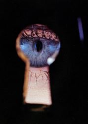 Irving Penn, Eye In Keyhole, New York (1953). Dye transfer print mounted to board. 49.8 × 33.7 cm, image, 52.1 × 35.6 cm, paper, 57.5 × 41.3 cm, mount. © Condé Nast.