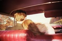 Kim and Mark in the red car, Newton, MA by Nan Goldin contemporary artwork photography
