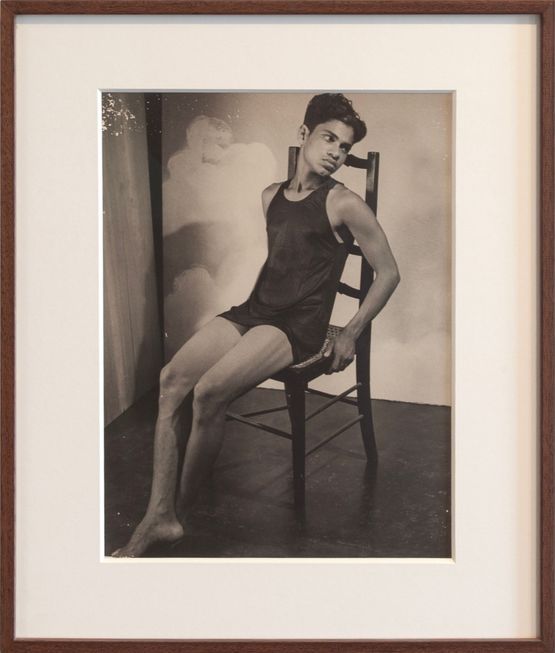 Young man on chair by Lionel Wendt contemporary artwork Photography