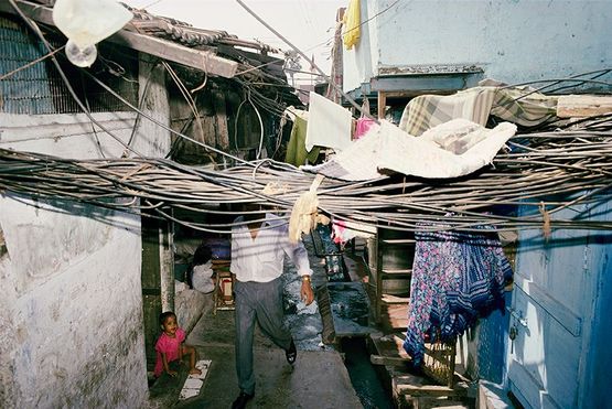 Office worker leaves home Dharavi Bombay by Raghubir Singh contemporary artwork Photography