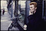 David Bowie in front of Tea  Sympathy in New York City by Kevin Cummins contemporary artwork photography