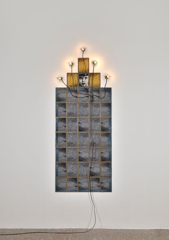 Monument, 1986 by Christian Boltanski, 39 frames, 5 sockets, 5
