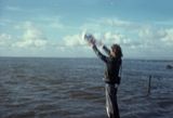Releasing a seagull Morecambe Bay Lancashire November 1976 by Andy Goldsworthy contemporary artwork painting